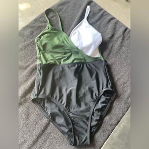 Brand new with tags but fell off one piece size small swimsuit from Kona Sol.
